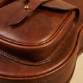 Troubadour Chestnut gig bag green room lifestyle shot, a genuine gift for musician or gift for guitarist