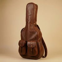 Troubadour Chestnut leather texture detail showing pull-up leather grain and natural patina