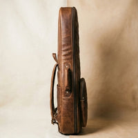 Aviator gig bag side profile with padded backpack straps for hands-free guitar carry