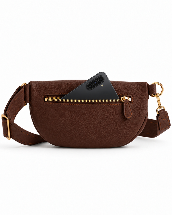 Coffee Brown leather sling bag with the zipper open and items pictured inside.