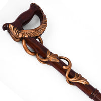 Close-up of The Ivy carved loop handle with copper-tone leaf and vine detailing