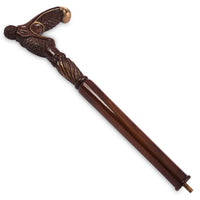 The Plume feather-carved derby handle, angled view