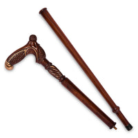 The Plume folding walking cane separated into two pieces