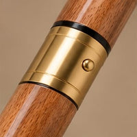 Brass collar with black accent rings on The Regent rosewood walking cane