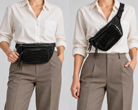 Black crocodile-embossed leather belt bag shown worn at the waist and across the body