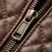 Aviator distressed leather guitar bag lifestyle shot, musician carrying gig bag through city street